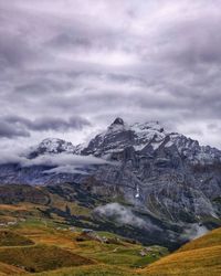 Scenic view of snowcapped mountains against sky