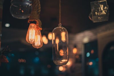 Close-up of illuminated light bulb