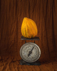 Close-up of orange pumpkin on table