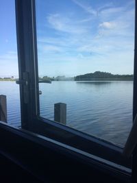 Scenic view of sea seen through window