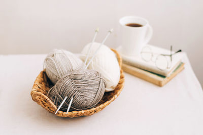 High angle view of wool in basket on table