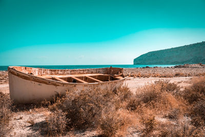 Scenic view of sea against clear blue sky