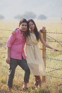 Portrait of asian couples standing in ranch farm