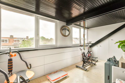 Low section of man exercising in gym