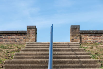 Low angle view of staircase against sky