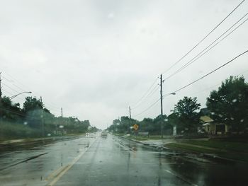 Road against cloudy sky