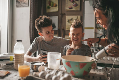 Group of people with food on table