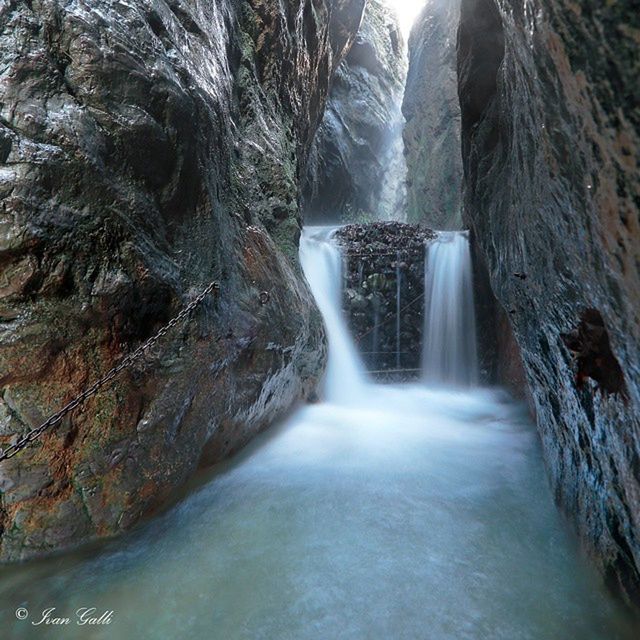 waterfall, water, motion, flowing water, beauty in nature, rock - object, scenics, flowing, long exposure, rock formation, nature, idyllic, splashing, power in nature, rock, day, waterfront, tranquility, blurred motion, tranquil scene