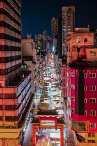 Illuminated buildings in city at night