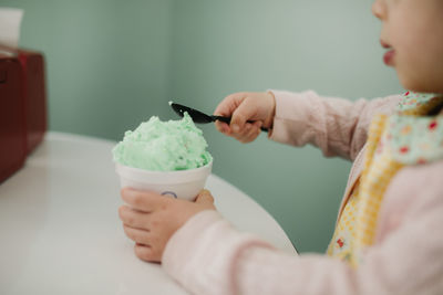 Green ice cream being eaten