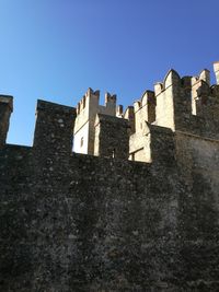 Low angle view of castle against clear sky