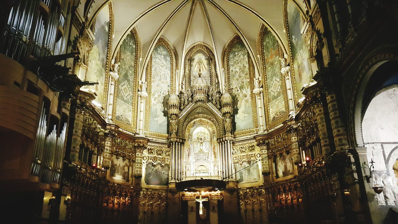 LOW ANGLE VIEW OF ILLUMINATED CATHEDRAL