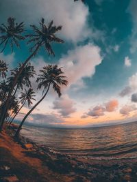 Scenic view of sea against sky at sunset