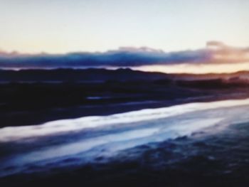 Scenic view of sea against dramatic sky