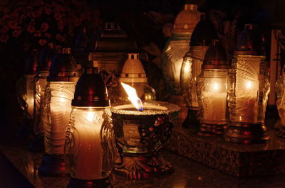 Lit candles in temple