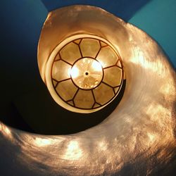 Low angle view of illuminated light bulb