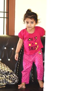 Portrait of girl standing at home