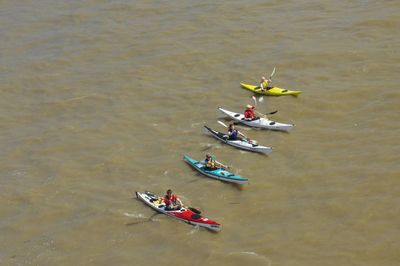 High angle view of people on boat in river