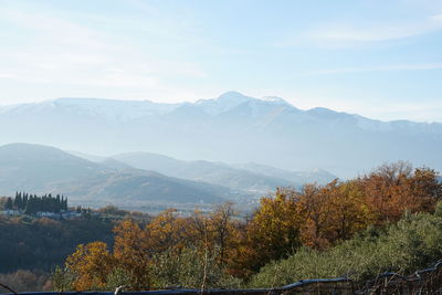 Scenic view of mountains against sky during autumn