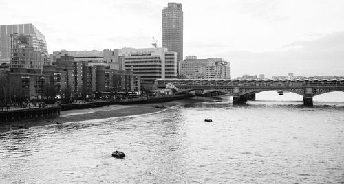 View of cityscape with river in background