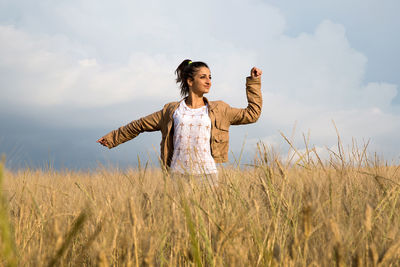 Woman standing on field