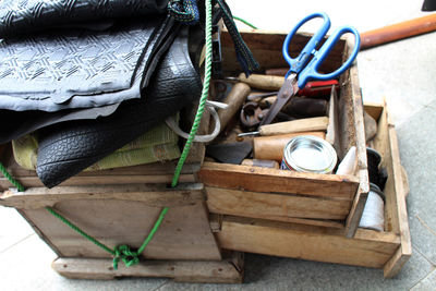 High angle view of old cart on wood