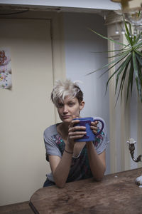 Young woman hanging out in her apartment