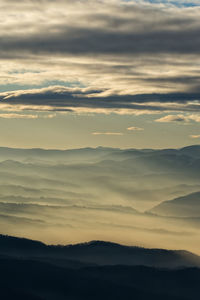 Scenic view of dramatic sky during sunset