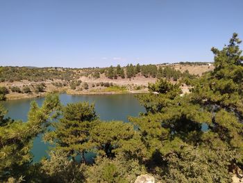 Scenic view of lake against clear sky