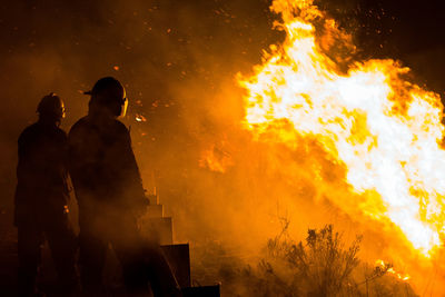 Firefighters working at night