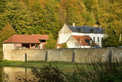 Houses by historic building of rouge-cloister-abbey 