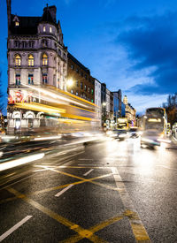 Light trails on city street at night