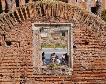 Group of people in front of historical building