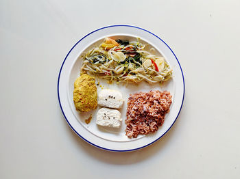 High angle view of breakfast served on table