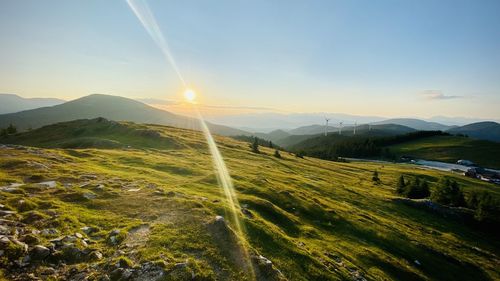 Scenic view of landscape against sky during sunset