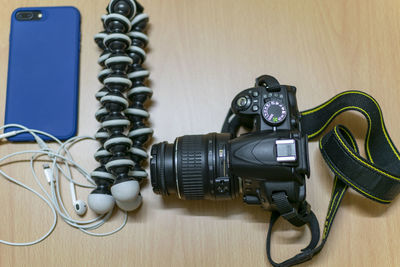 Close-up of camera on table