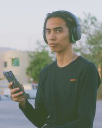 Young man using mobile phone