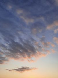 Low angle view of dramatic sky during sunset