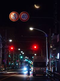 Blurred motion of people in city at night