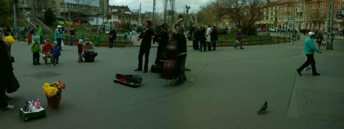 GROUP OF PEOPLE IN CITY