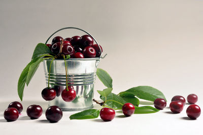 Close-up of fruits against white background