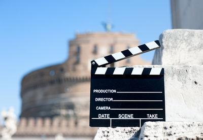 Film slate against castel sant angelo