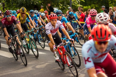 People riding bicycle on street