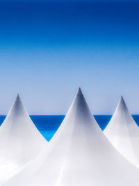 Low angle view of parasol against sky