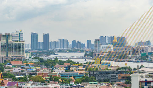 Buildings in city against sky