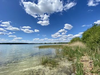 Scenic view of beach against sky