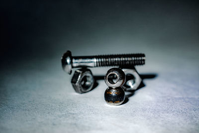 High angle view of nuts and bolt against white background
