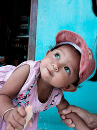 Portrait of girl holding ice cream