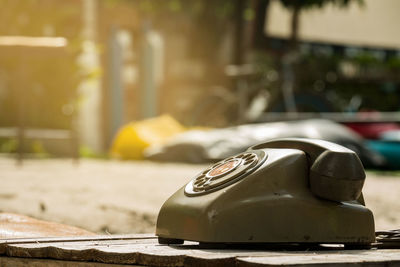 Close-up of telephone on table