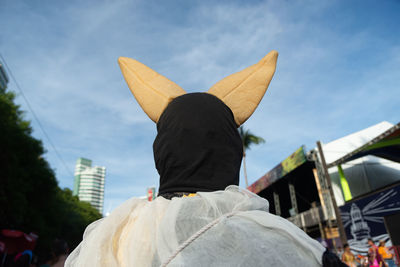 People in costumes are seen parading and having fun during fuzue, pre-carnival